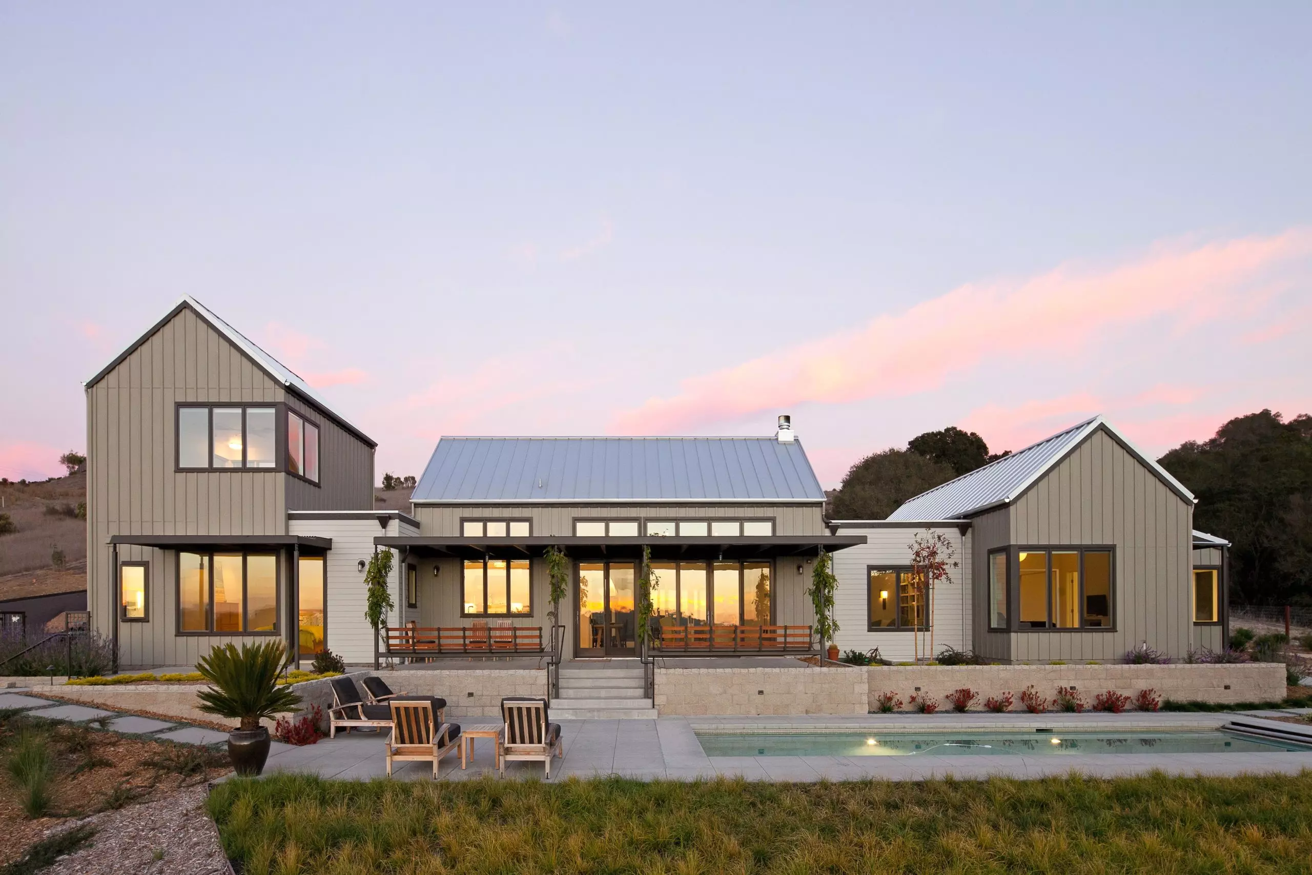 exterior of home with in ground pool